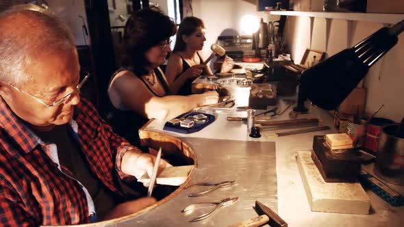 Goldsmith shaping wood