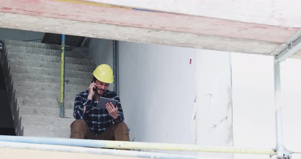 Construction worker having call and holding tablet