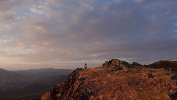 Man hiking to viewpoint on mountain, Puerto de la Puebla, Spain