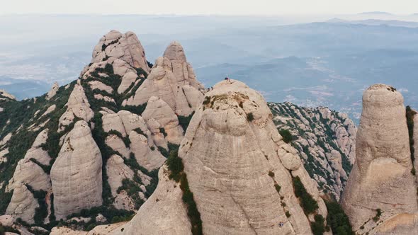 Aerial Drone Shot of Multi Peaked Montserrat Mountain Range in Barcelona Catalonia Spain