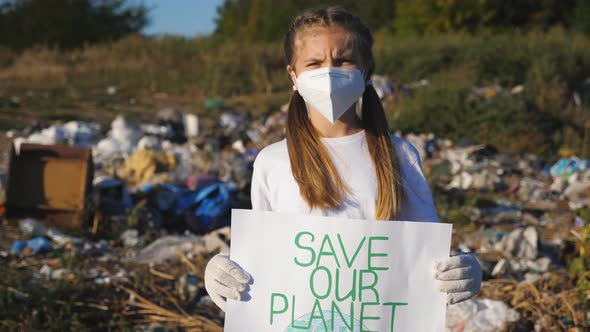 Portrait of Small Girl Holds in Hands Poster of Environmental Movement for Saving Planet