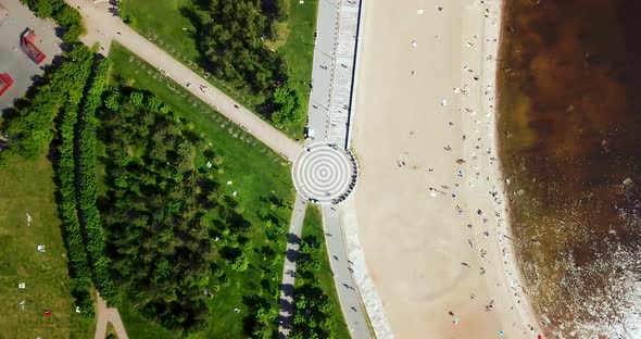 Flying Over the Green Recreation Park. Geometric Fields and Tracks. Summer Sunny Landscape. Aerial