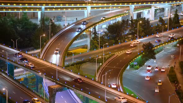 busy interchange traffic at night in city