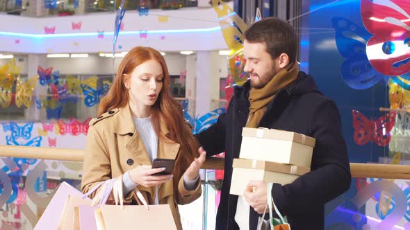 Wife Discussing with Husband About Shopping