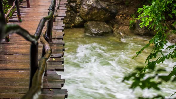 Old Wooden Bridge Across the River