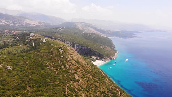 Aerial Drone View of Gjipe Beach and Canyon Dhermi Albania Hidden Paraside with Boats Tourists