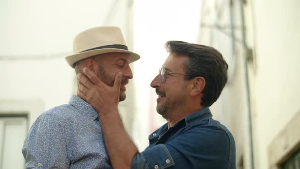 Medium Shot of Guy Couple Looking at Each Other with Tenderness