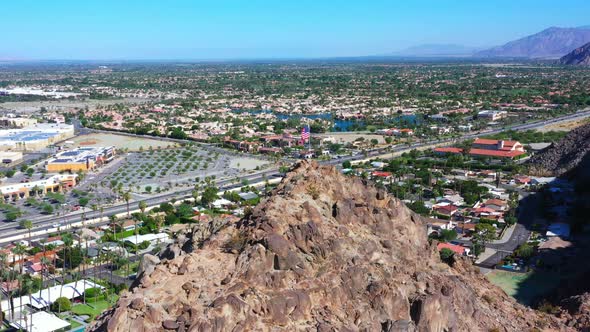 Pride of American flag waving at Indio Coachella Califronia mountain top