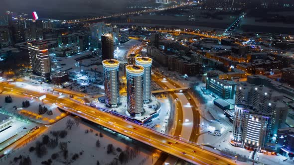 Hyperlapse Time-lapse of Car Traffic Road at Winter Night in Novosibirsk. Drone Aerial Top View, Fly