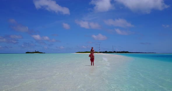 Fun people after marriage in love enjoy luxury on beach on white sand background 