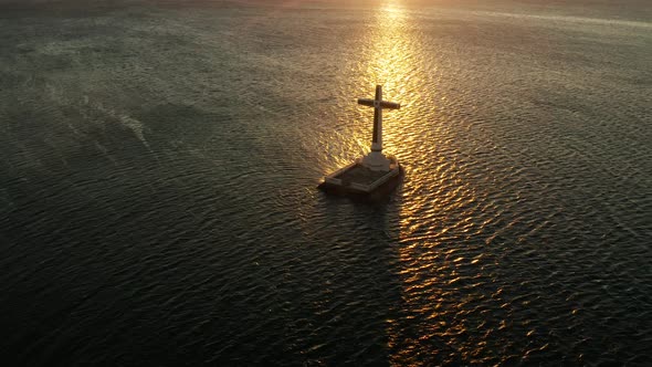 Sunken Cemetery Cross in Camiguin Island Philippines