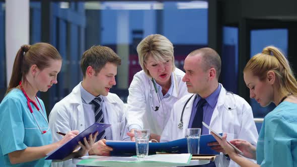 Team of doctors having a meeting in conference room