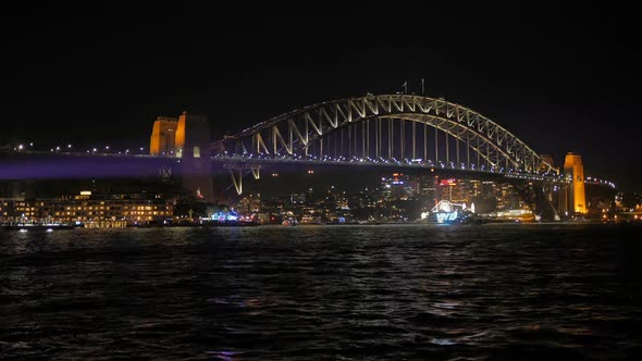 time lapse of sydney harbour bridge during the 2015 vivid festival