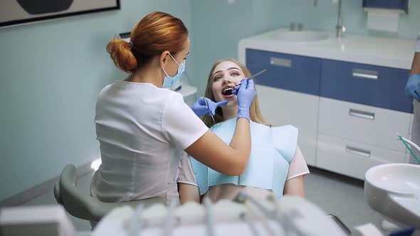 Female Stomatologist in Mask