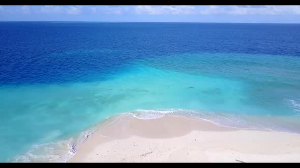 Aerial top view seascape of paradise coast beach lifestyle by transparent water and bright sandy bac