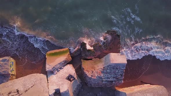 Aerial birdseye view of abandoned seaside fortification buildings at Karosta Northern Forts on the b