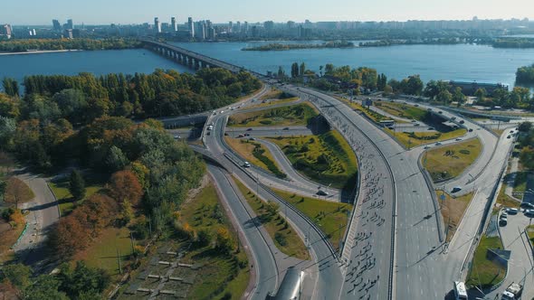 Aerial Drone Footage. Marathon Running on the Road Junction, Wide Shot