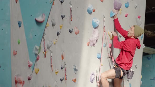 Professional Having Training in Climbing Gym