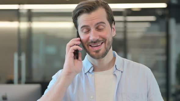 Mature Adult Man Talking on Phone