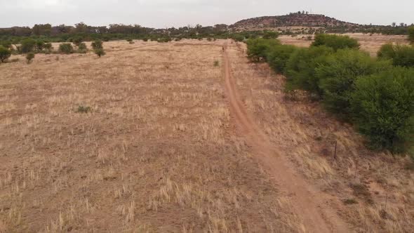 Drone Reverse Fly Over a Cloudy Overcast Day