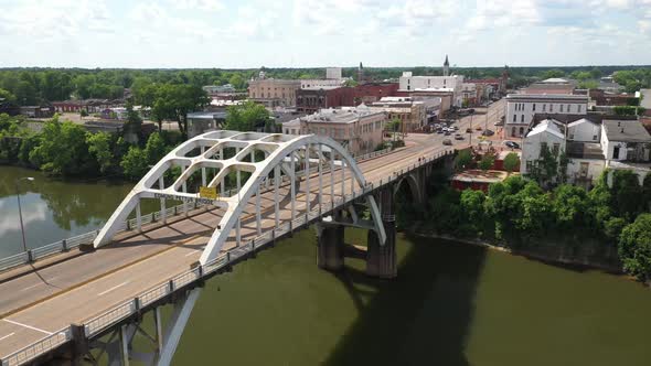 Edmund Pettus bridge in Selma, Alabama with drone video moving up to skyline.