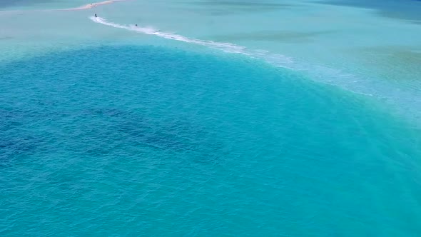 Aerial panorama of seashore beach by blue lagoon with sand background