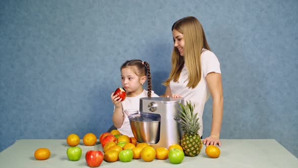 Girl Eating Organic Apple. Young beautiful girl eating healthy fruit