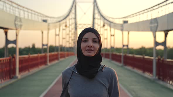 Pretty Arab Woman in Hijab During Jogging Exercise