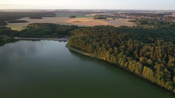 Picturesque Sunset on the Drozdy Reservoir with a View of the City of Minsk. Belarus