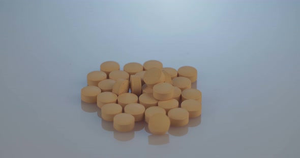 Prescription drugs - Capsules, pills, tablets on reflective background