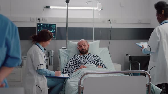 Medical Practitioner Doctors Examining Sick Man Checking Sickness Symptom