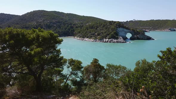 Puglia Coast in South Italy Sea - The Sea Arch of San Felice Near Vieste in Gargano Natural Landmark