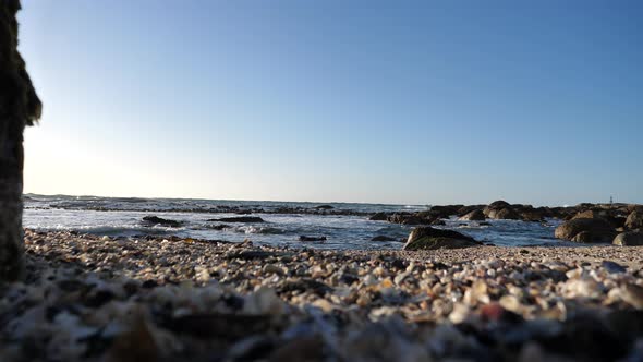 Low angle wide shot of peaceful Atlantic ocean water on a sunny blue sky day in Bantry Bay, South Af