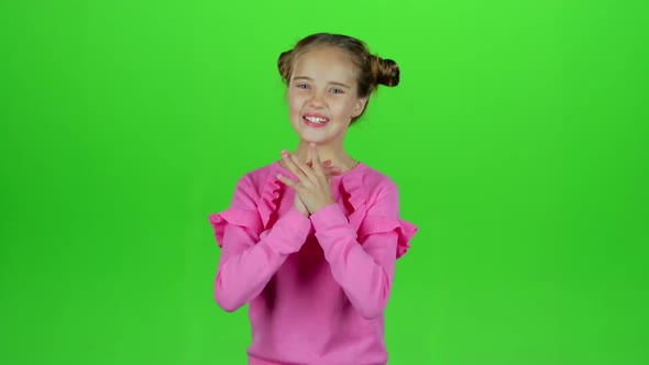 Little Girl Rejoices in Victory. Green Screen