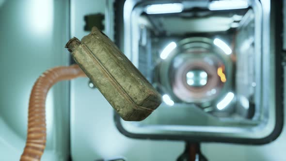 Old Fuel Canister Floating in Internation Space Station