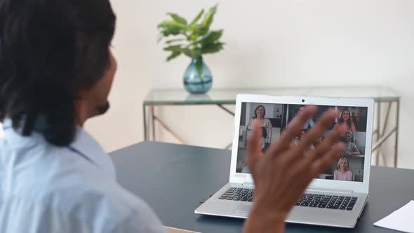 Intelligent Clever Indian Male Office Employee Making Video Call