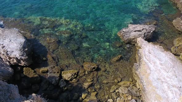 Rocky and Stony Seashore in Untouched Sea