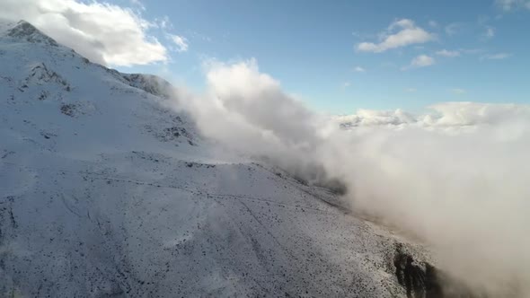 Aerial View Of Foggy Mountains