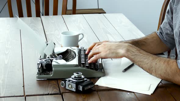 Males Hands On Typewriter