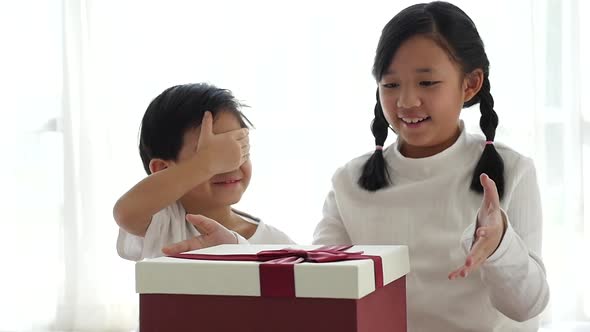 Cute Asian Children Opening Gift Present Box