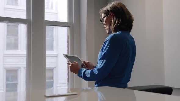 Female business professional working in a modern office