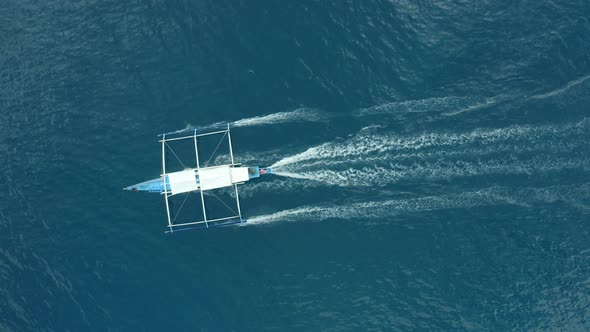 WS AERIAL HA Outrigger boat in sea, El Nido, Palawan, Philippines