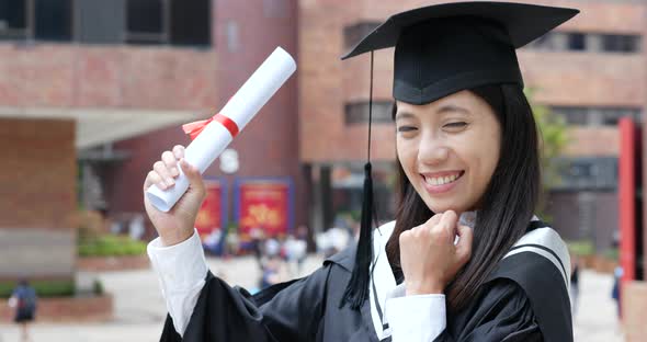 Happy cheerful woman get graduation