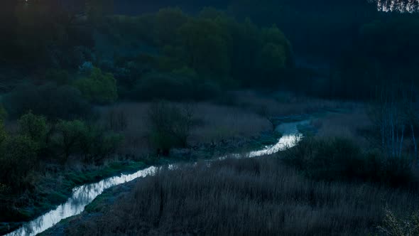 Sunrise over the valley wiht a river and fog, timelapse, 4k