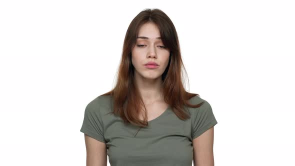 Portrait of Content Confident Woman Wearing Basic Tshirt Nodding and Agreeing with Interlocutor