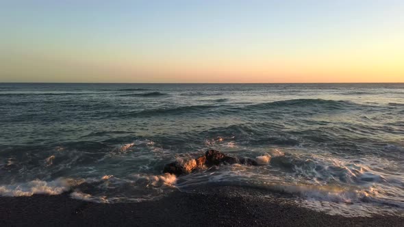 Ocean Waves On Sunset