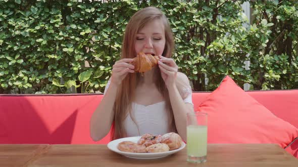 Girl Eat Croissant Sitting in Outdoor Cafe in Sunny Day Fresh Food Bakery Bun