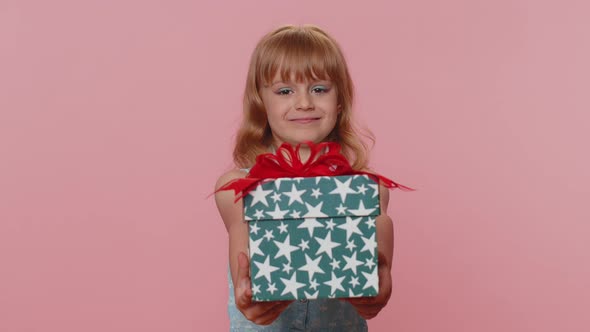Lovely Smiling Preteen Child Girl Kid Presenting Birthday Gift Box Offer Wrapped Present Celebrating
