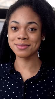 Closeup Vertical Video Portrait of Positive Pretty Elegant African American Business Woman Financial
