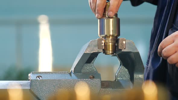 Process of Assembly by Worker Hands at Industrial Factory